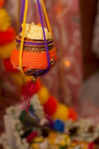 Vibrant handmade pot used in Hindu religious offerings and decorations.